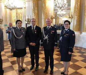 Od lewej: podinsp. Edyta Witkowicz, Marcin Chotomski, gen. insp. Jarosław Szymczyk, insp. Anna Rosół